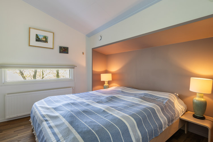 vakantiehuis de Zee de Zee slaapkamer met tweepersoons bed
