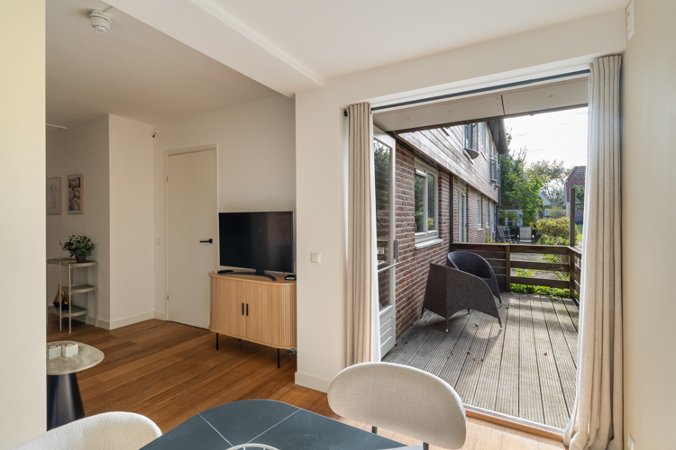 appartement Schiermonnikoog boszicht 16b terras openslaande deuren