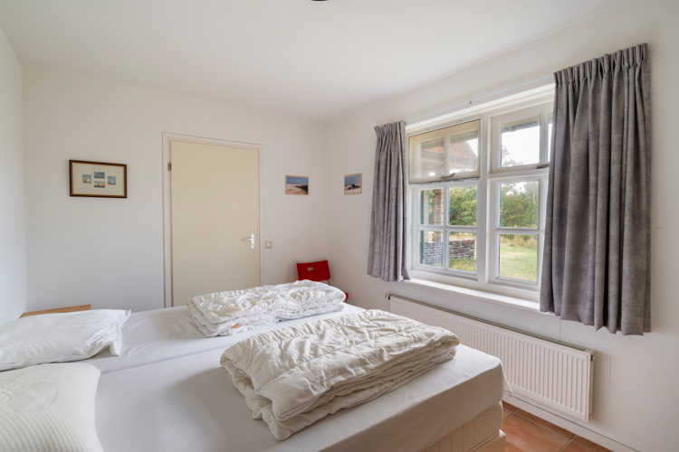 vakantiehuis Holidays slaapkamer Begane grond zijkant