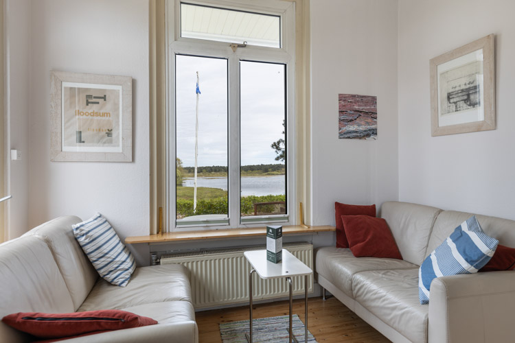 vakantiehuis Duin aan Zee woonkamer met bank en uitzicht